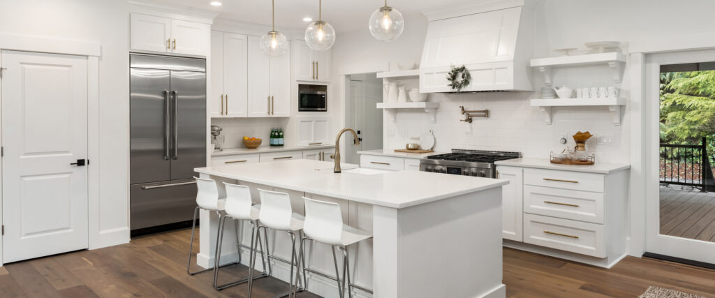 Kitchen with cabinetry, counters and an island